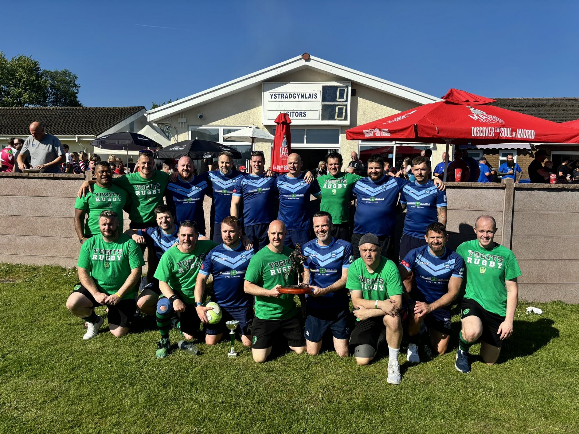 On a sunny Ystrad Saturday in June, around 200 Touch rugby players descended on the Rec for the First Ever ‘Yogits TryFest’ to compete for the Brian Westall Trophy.
As hosts, we had the honour of entering 2 sides in the 10 team Vets Touch tournament (the Greens and the Bears) and our Walking side also took part in a 3 team round robin. These games run simultaneously alongside a 6 team women’s tournament.
The Bears kicked the day off and had a mixed day of results with 2 draws and 2 defeats in the group stage before a 2-1 Win followed in the 7th/8th place play off.
The Greens had a more successful day with 3 wins and 1 draw in their group, meaning they would take on Banos Old Boys for the Brian Westall Trophy. A tense game ended in 1-1 draw with both teams agreeing to share the trophy, showing the true spirit of Vets Touch.